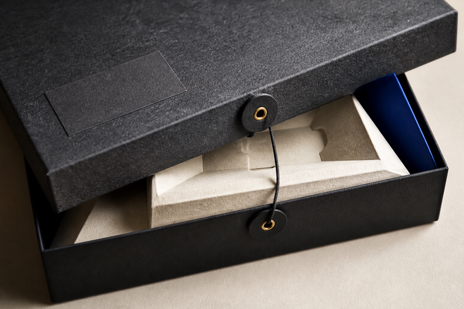 Textured presentation packaging with a custom insert and fastening detail
